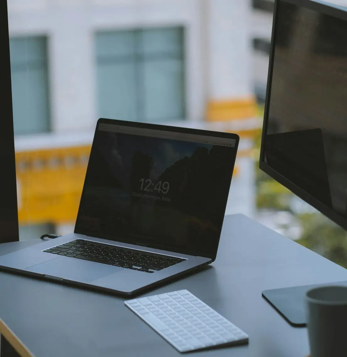 macbook pro on white table